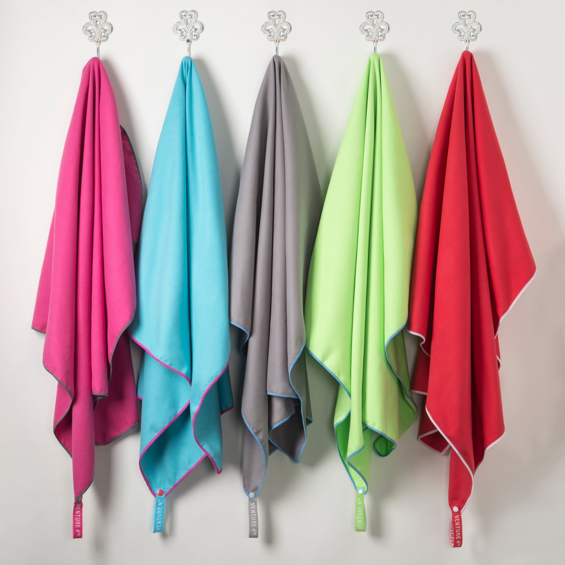 VENTURE 4TH microfiber towels hung to show the colour range