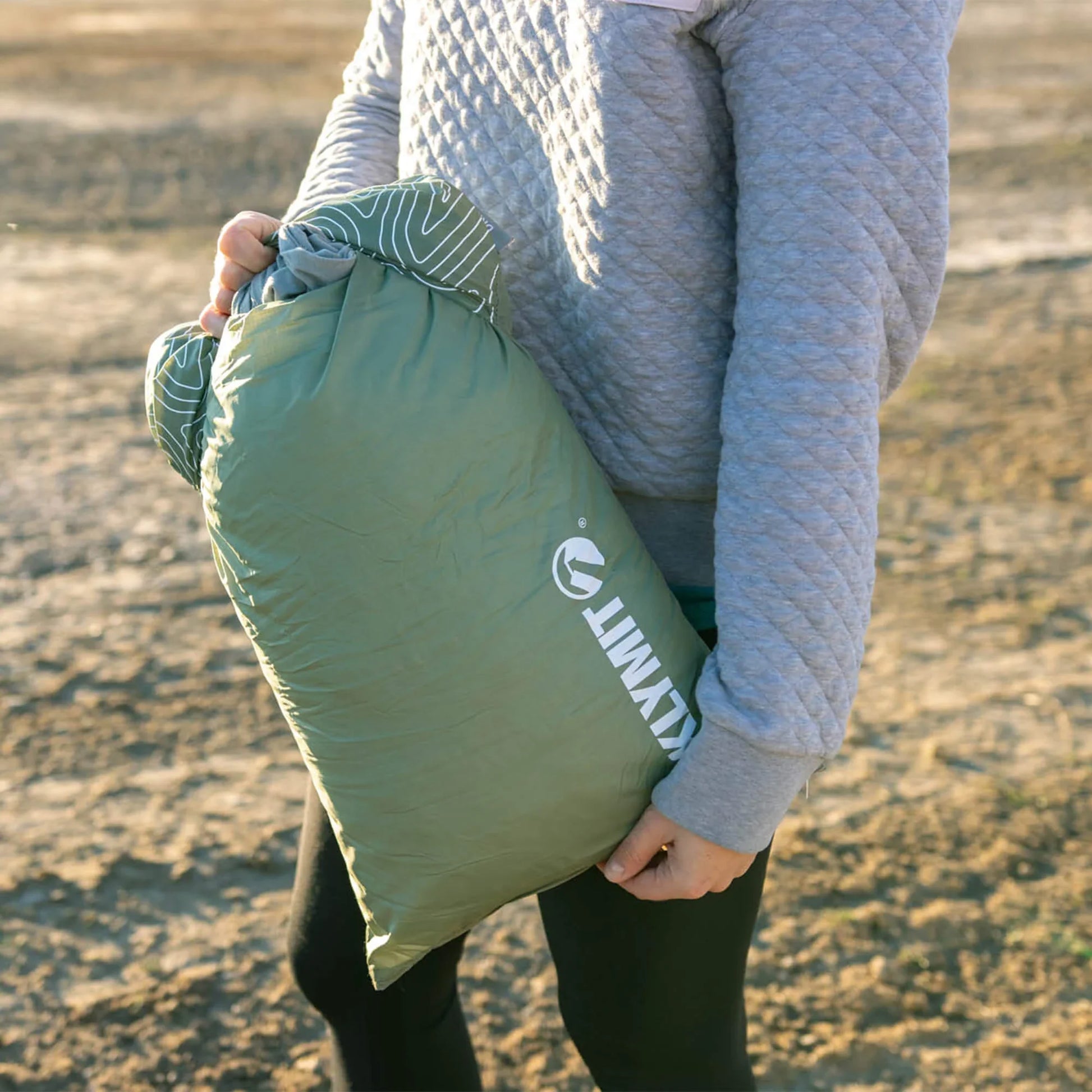 Klymit Drift Summit camp pillow in use at a campsite