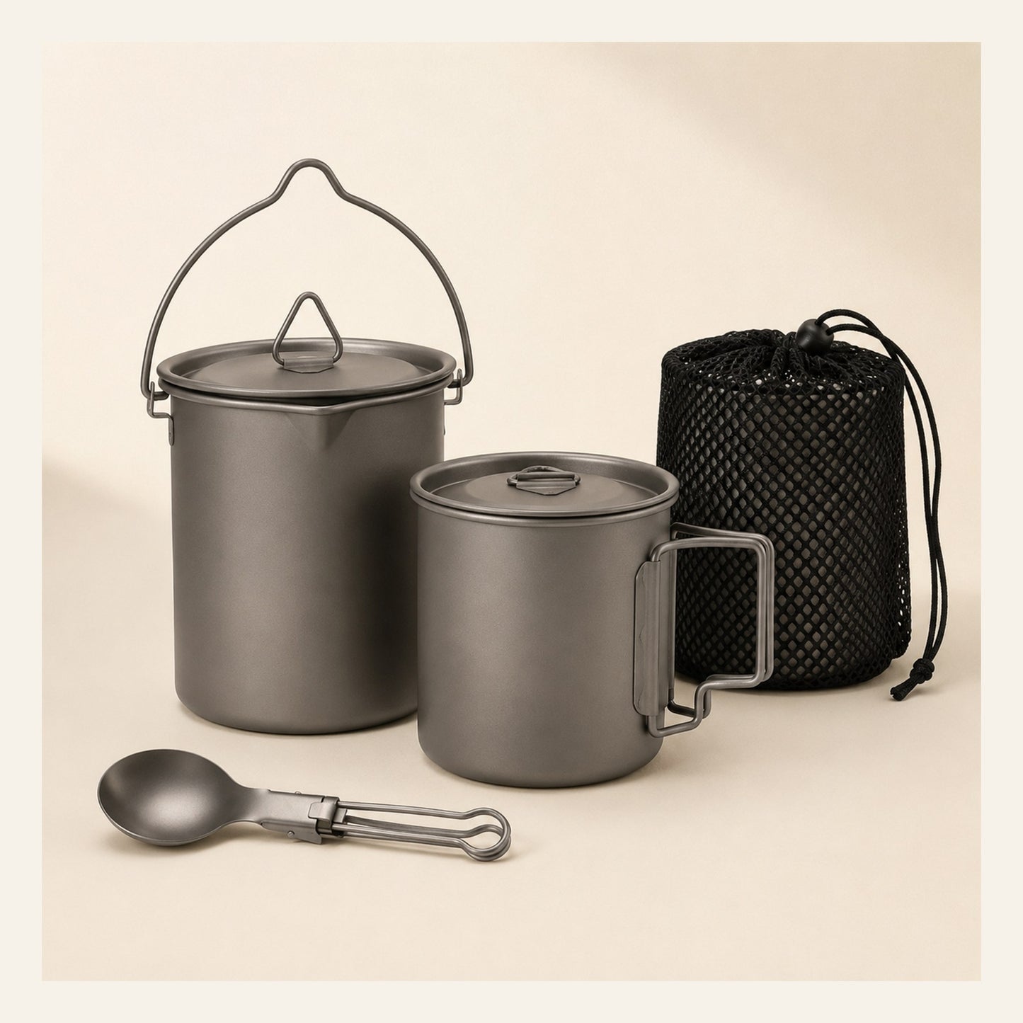 Titanium Trail Cookware Set — pot, mug, folding spoon, and mesh storage bag