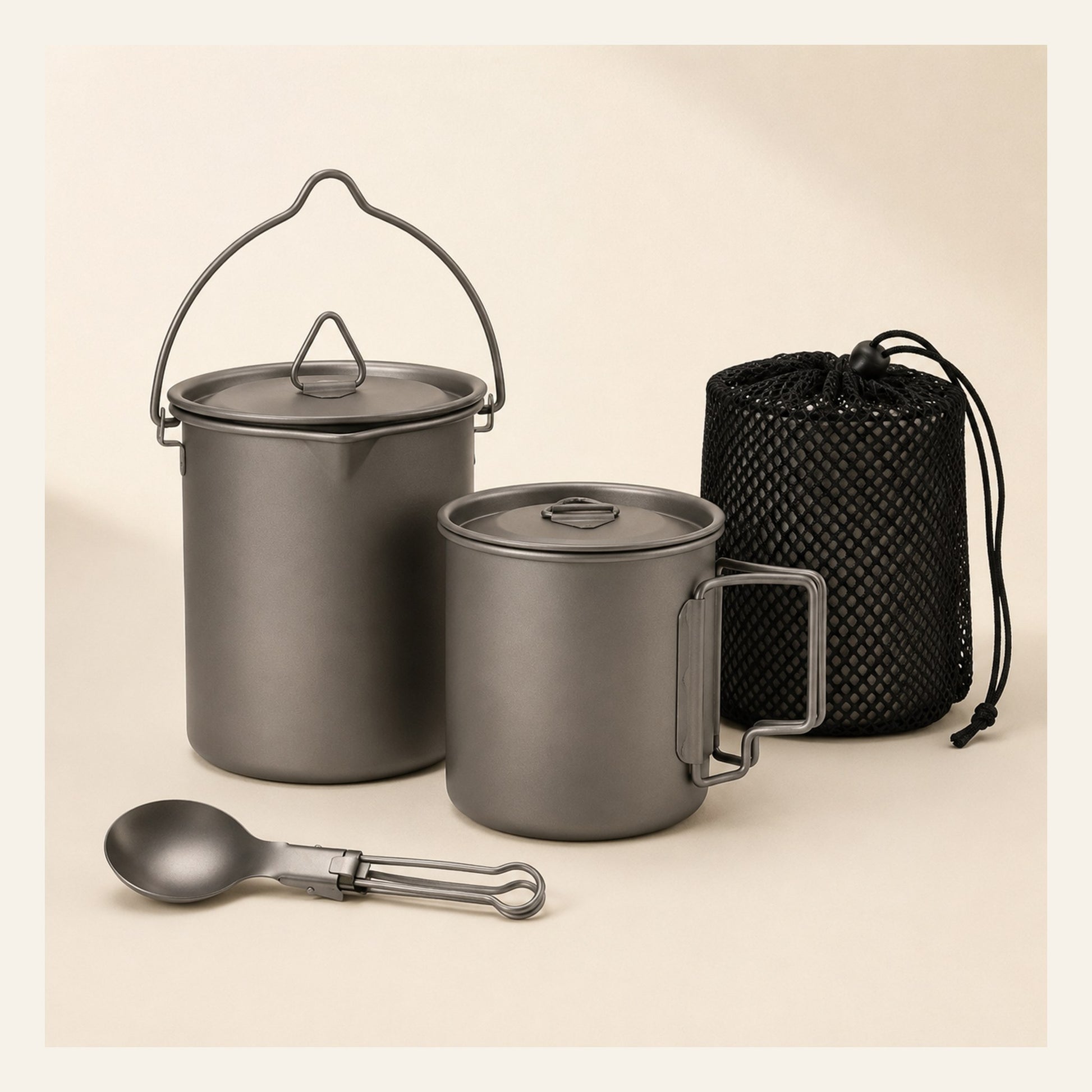 Titanium Trail Cookware Set — pot, mug, folding spoon, and mesh storage bag